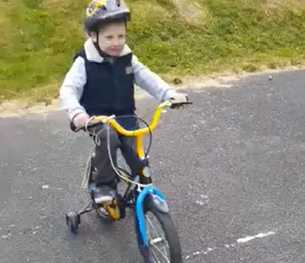 boy riding a bike